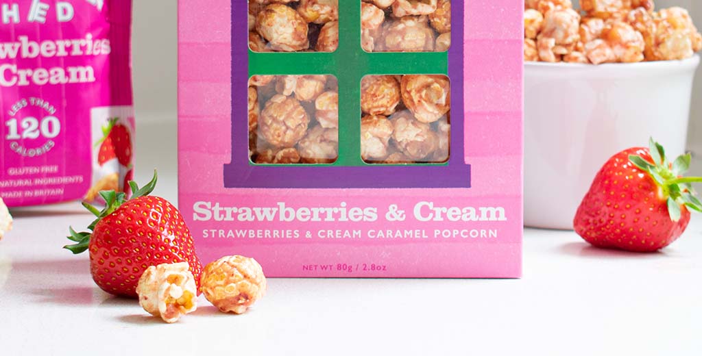 Popcorn Shed's new blog post about perfect easter brunch pairings. Pictured: strawberries & cream gourmet popcorn