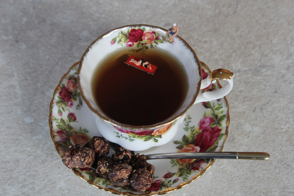 A cup of tea and Chocolate popcorn