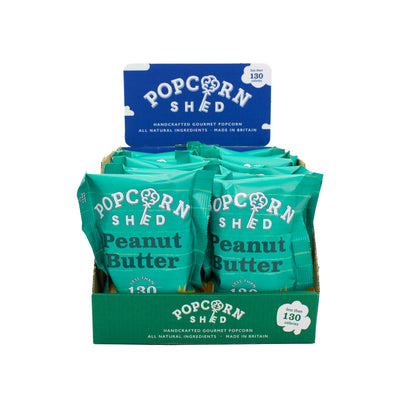 Display of Popcorn Shed Peanut Butter popcorn packets on a white background