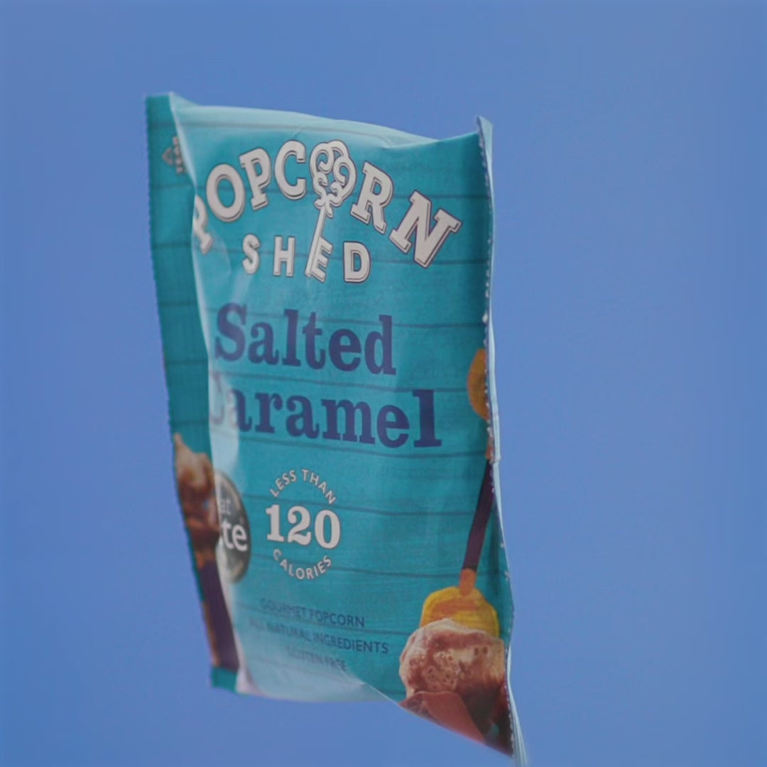 Load video: multiple clips of of popcorn kernels and snack packs